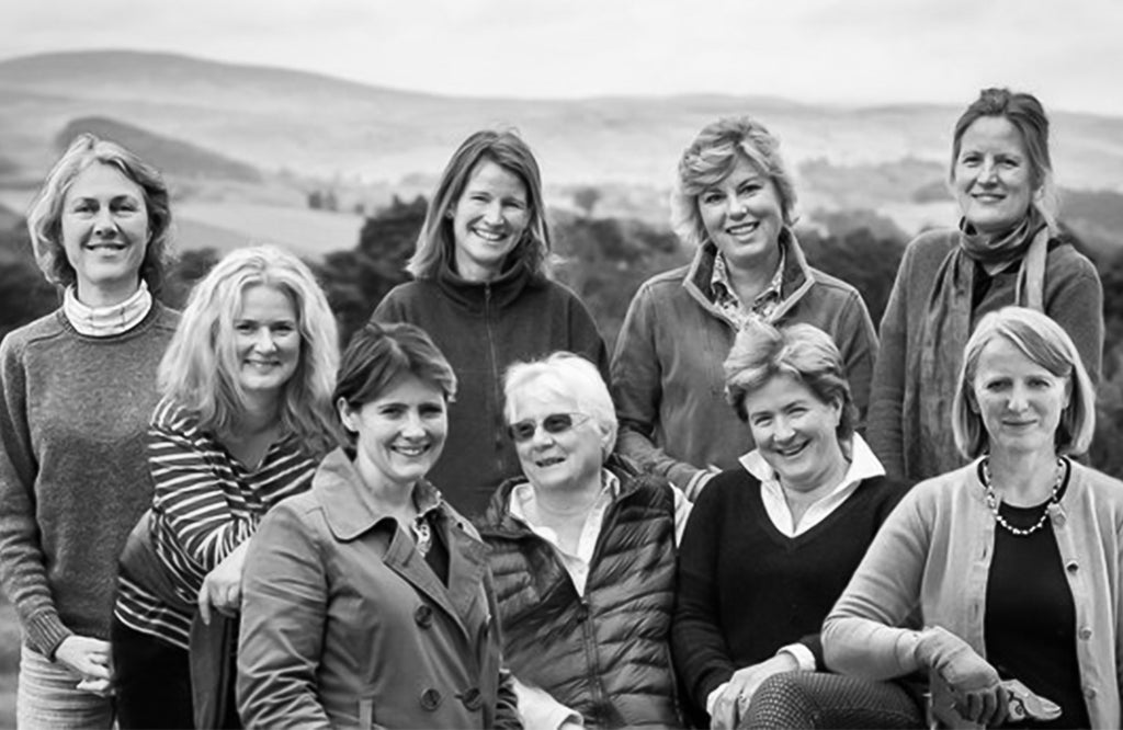 Group photograph of the nine women who make up the Tea Gardens of Scotland