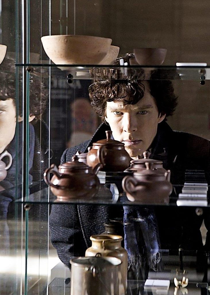Benedict Cumberbatch examines Canton Yixing teapots in season 1 episode 2 "The Blind Banker" of BBC's Sherlock