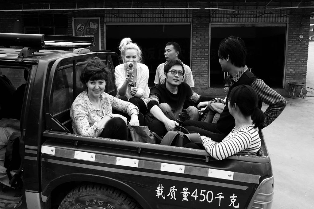 Canton Tea's Jen and Ali in the back of a truck in Taiwan